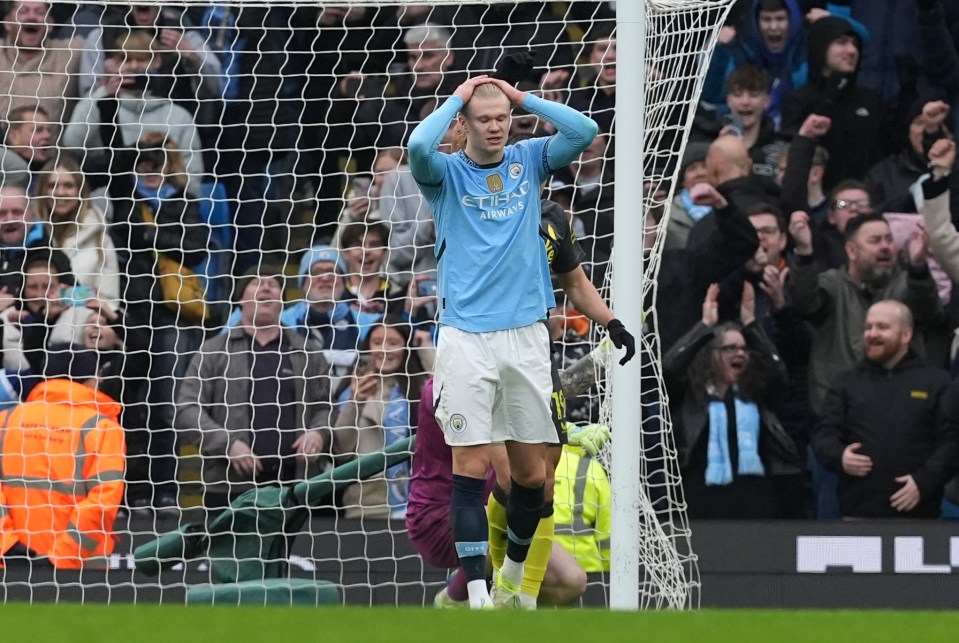 Erling Haaland looks dejected after a missed penalty and an offside call.