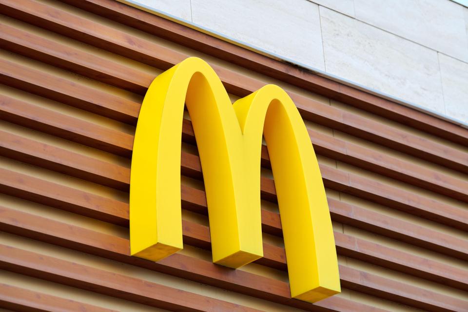 McDonald's golden arches logo on a building.