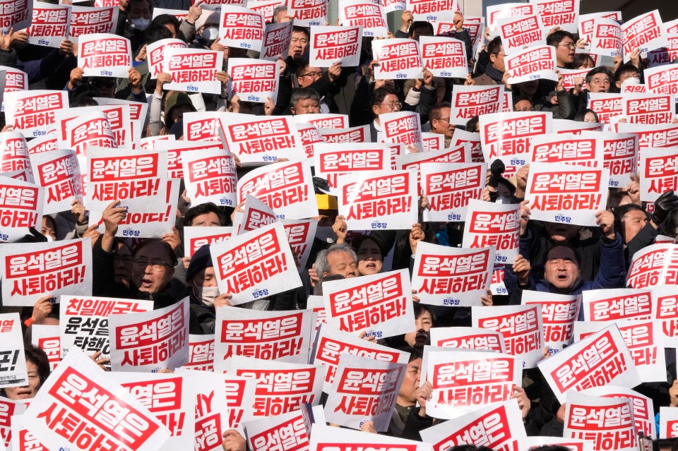 Members of main opposition Democratic Party stage a rally against South Korean President Yoon Suk Yeol