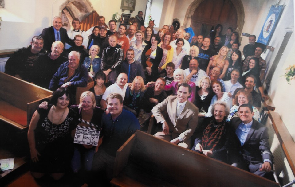 The cast and crew during the Christening for Neil, the baby