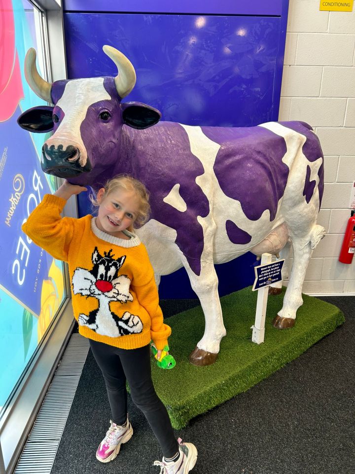 Six-year-old Millie meets the star of the show at Cadbury World