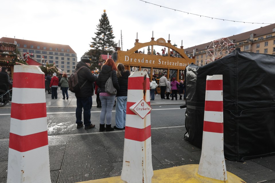 Mobile vehicle barriers in front of the Striezelmarkt in Germany after the attack in Magdeburg