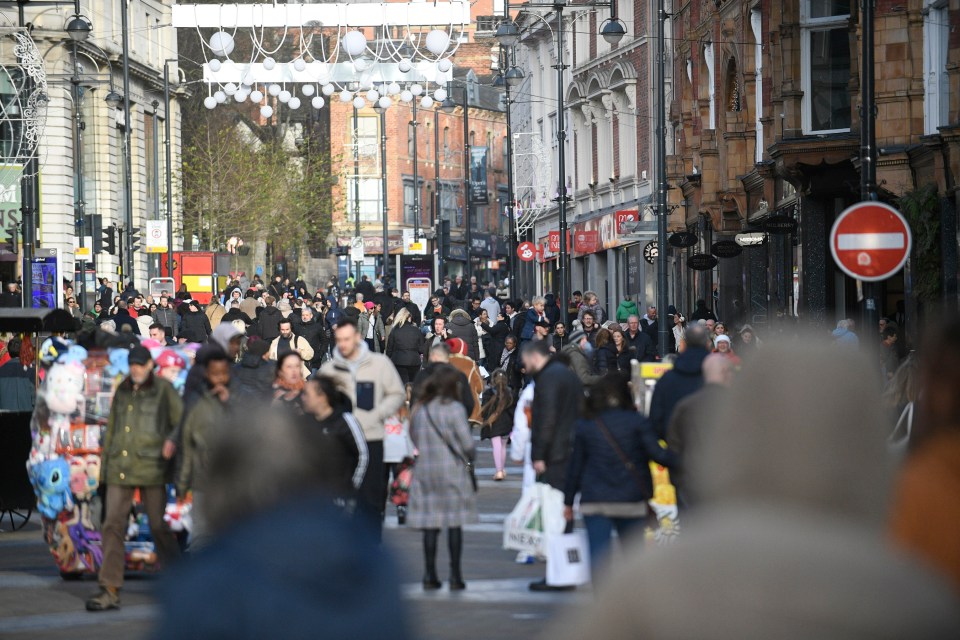 Shoppers battling the winds in Leeds