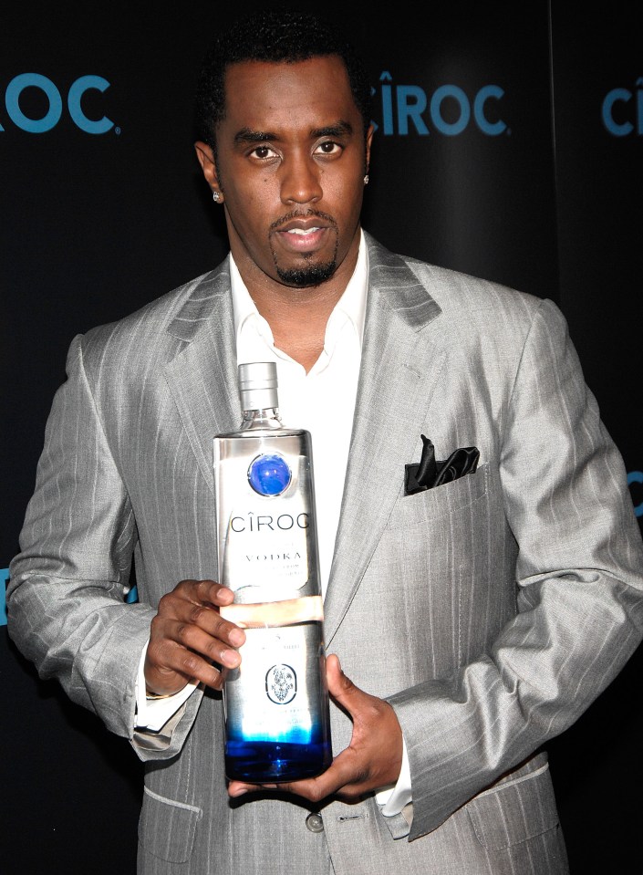 Sean Diddy Combs holding a bottle of Ciroc Vodka.