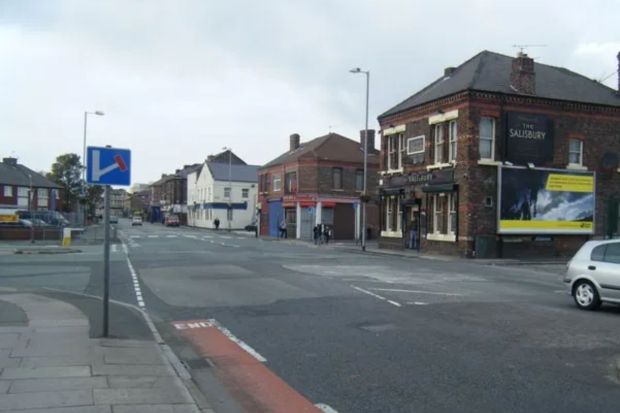 Street scene with shops and The Salisbury pub.