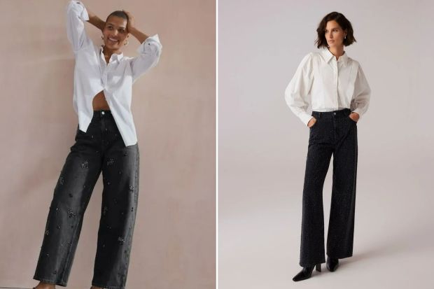 Two models wearing white shirts and embellished black jeans.