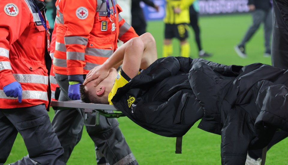 He was stretchered off after full-time