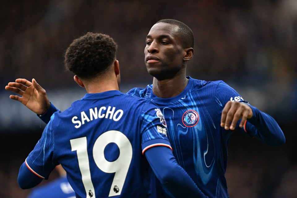 Jadon Sancho congratulates Jackson for his goal