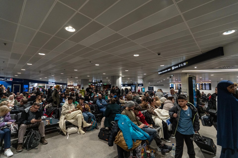 Passengers inside the airport's Terminal 3