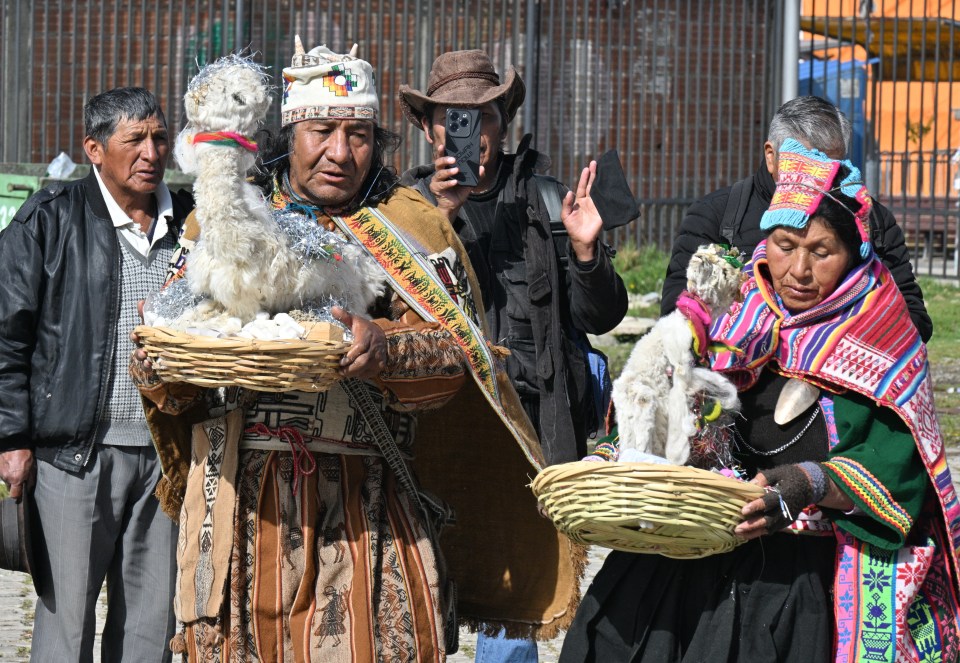 Aymara priests perform an Andean ritual.