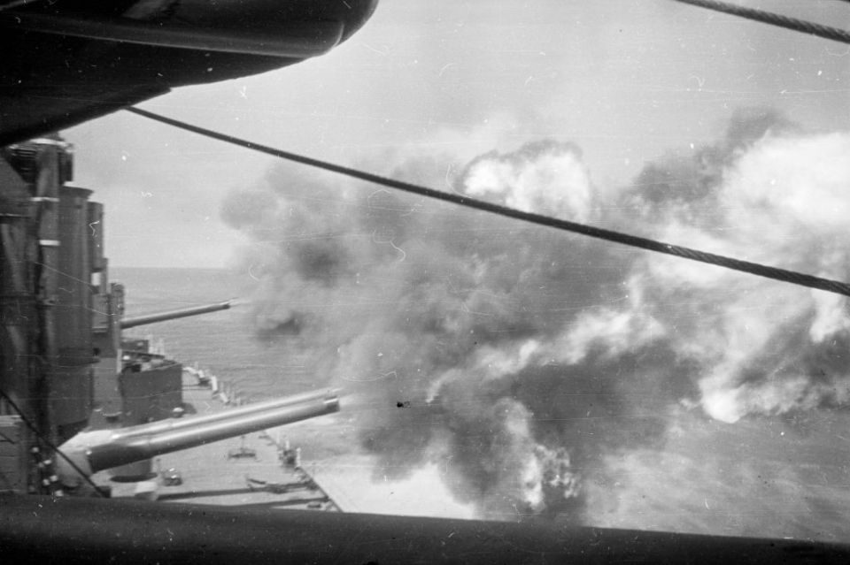 HMS Iron Duke firing its guns in 1939.