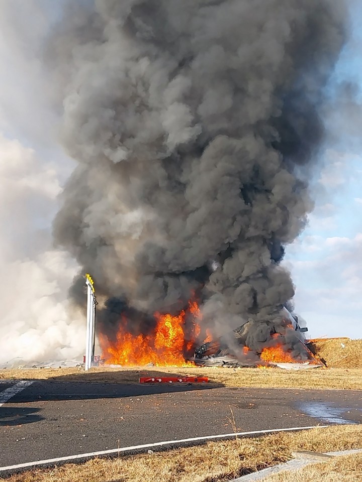 The jet burst into flames after crashing at the airport