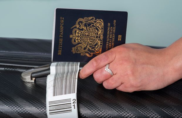 British passport on a suitcase.