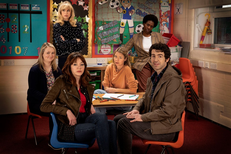 Motherland cast photo: Anne, Amanda, Liz, Julia, Meg, and Kevin in a classroom.