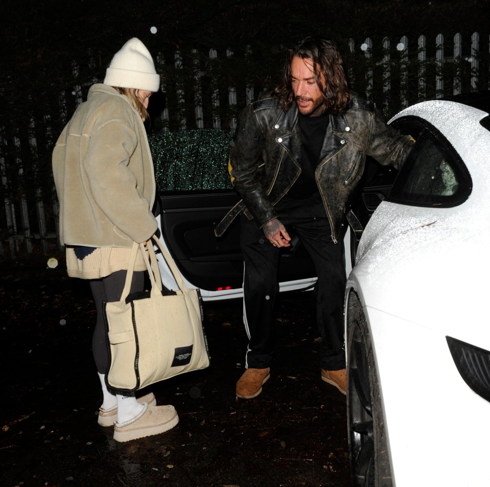 Gentleman Pete opened the door to let Jowita in the passenger side of his supercar