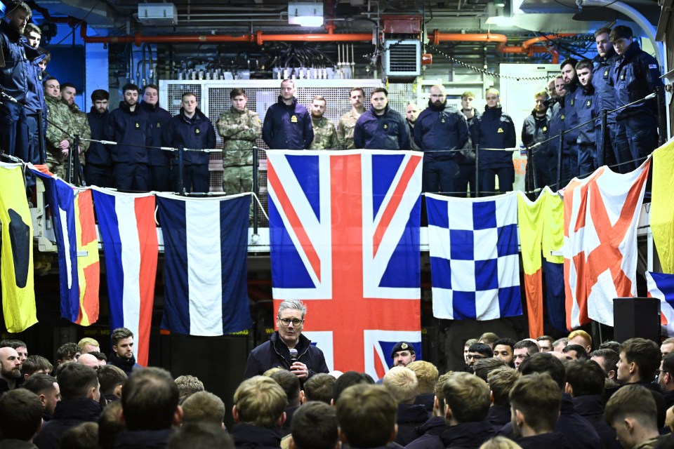 Prime Minister Keir Starmer addressing military personnel on a ship.