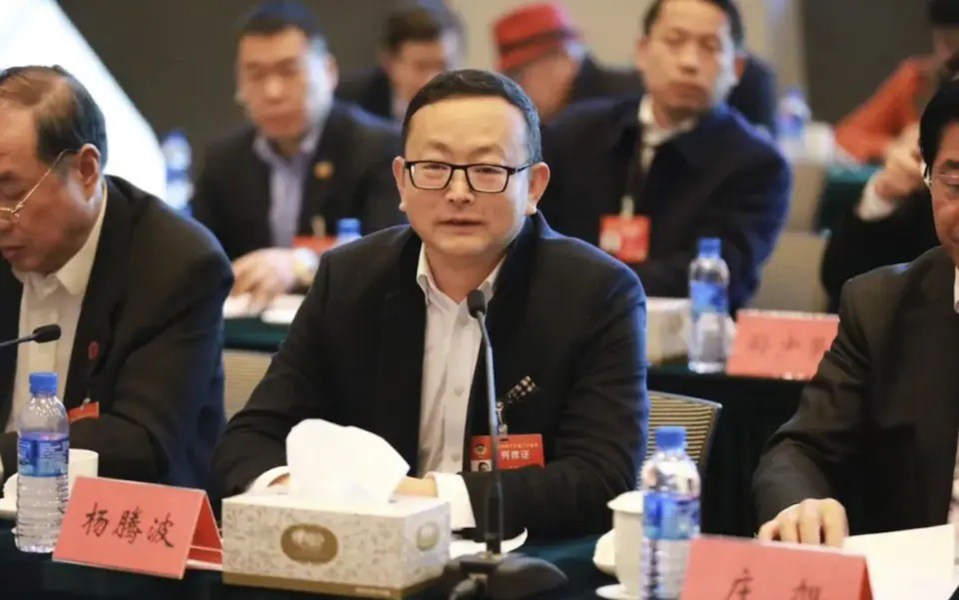 Yang Tengbo, a Chinese spy, at a meeting.