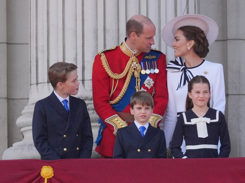 Prince William, Princess Catherine, Prince George, Prince Louis, and Princess Charlotte on Buckingham Palace balcony.