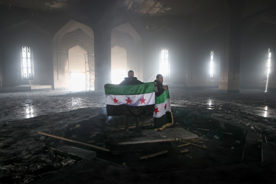 They raised the flag in the burnt out mausoleum