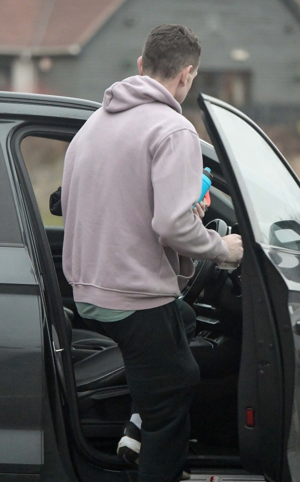 The shamed ref, seen here getting into his car after his gym outing, has also been the subject of a new probe over allegedly issuing a yellow card to order