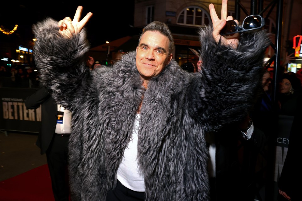 Robbie Williams wore this bold faux fur jacket at the premiere of his upcoming biopic in Paris