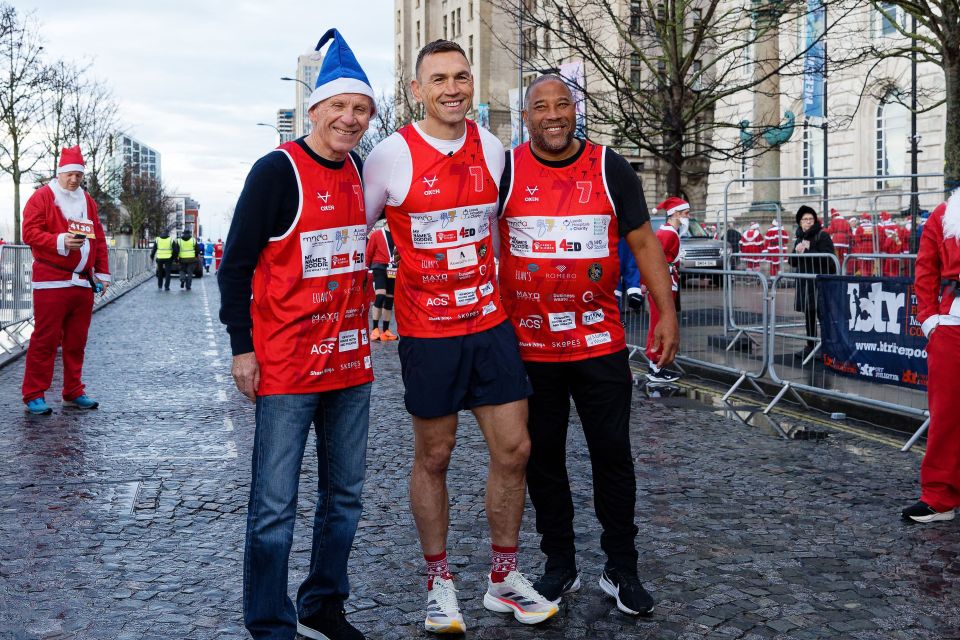 The Prince of Wales hailed rugby star Kevin Sinfield’s latest fundraiser, pictured with John Barnes and Peter Reid at yesterday’s Liverpool Santa Dash