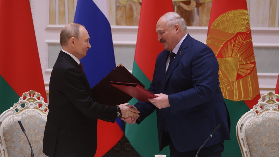 Putin and Lukashenko attend a signing ceremony during a meeting of the Supreme State Council of the Union States of Russia and Belarus