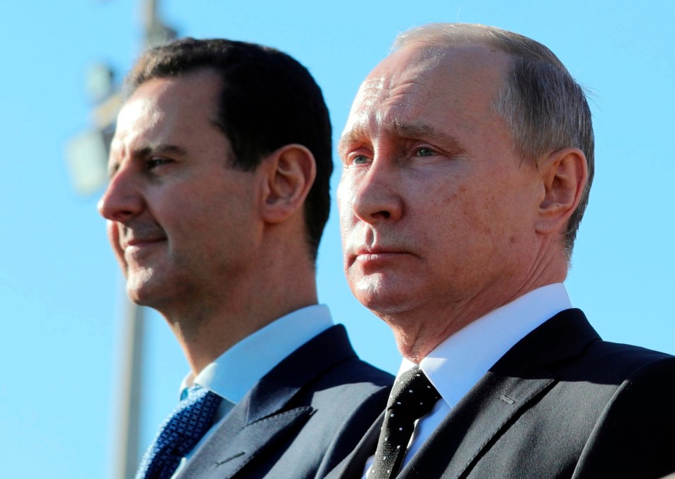 Vladimir Putin, right, and President Assad, left, were firm allies