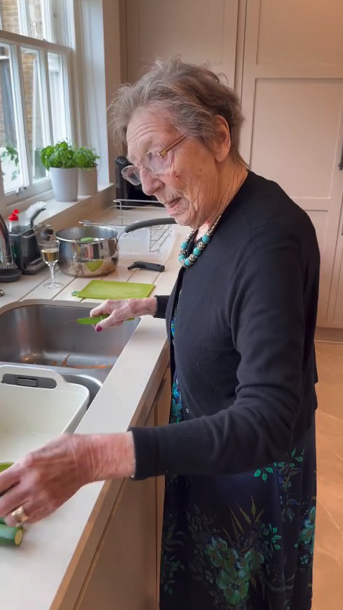 Ruth Langsford's mother preparing vegetables in a kitchen.