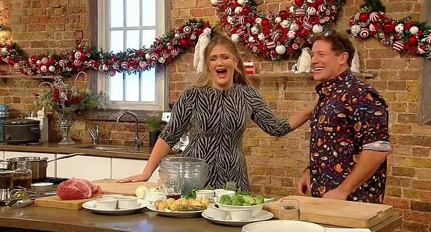 Poppy O'Toole and a male chef on Saturday Kitchen, preparing a meal.