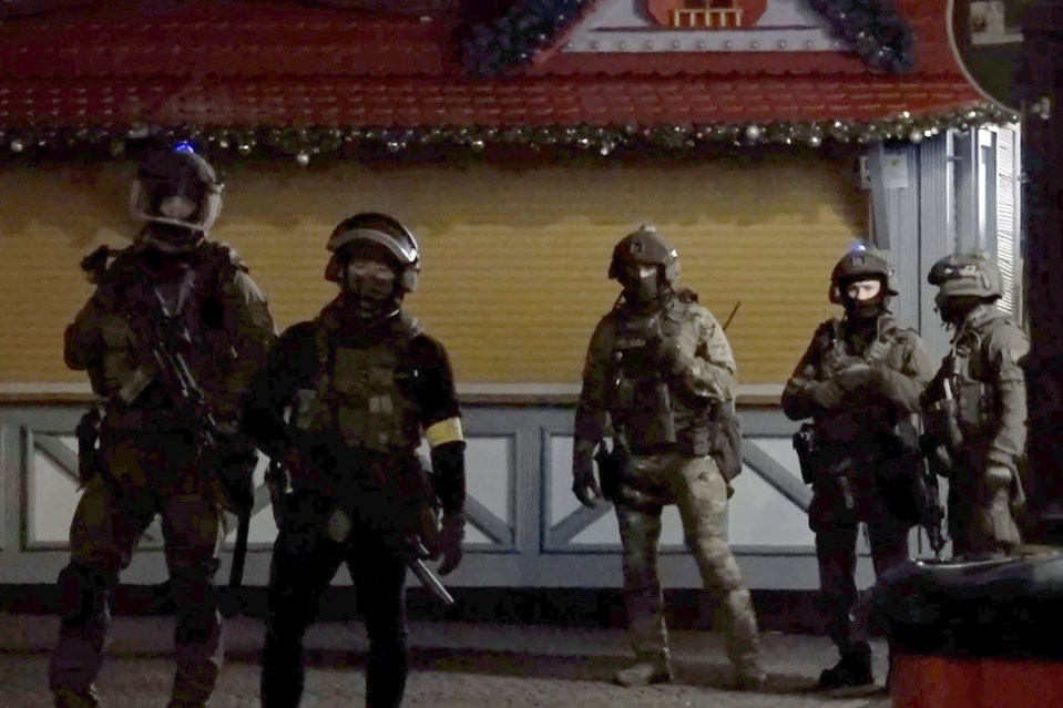 Police officers at a Christmas market.