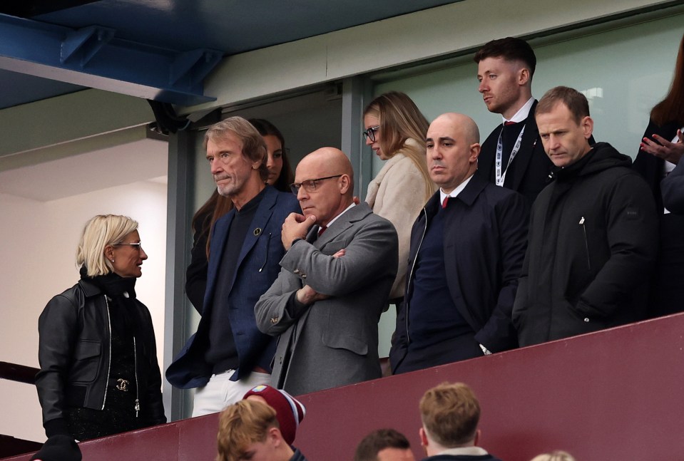 Sir Jim Ratcliffe and Manchester United executives watching a Premier League match.