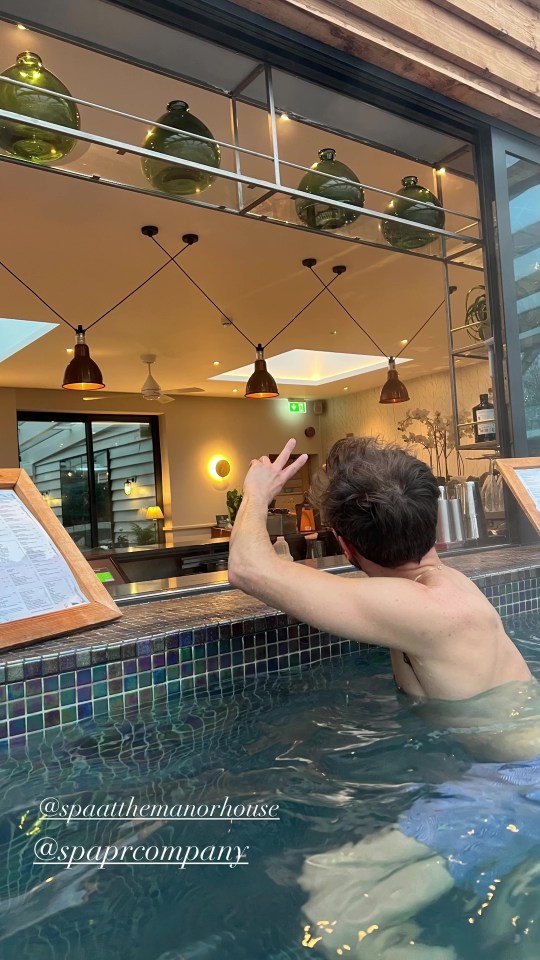 Man enjoying a spa day in a pool.