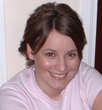 Photo of a smiling young woman.