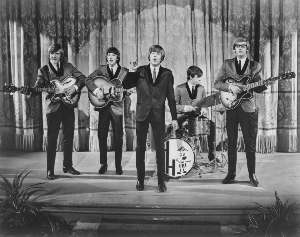 (left to right) Bassist Karl Green, guitarist Keith Hopwood, singer Peter Noone, drummer Barry Whitwam and guitarist Derek Leckenby of Herman's Hermits starring in the MGM film 'Hold On!' in 1966. (Photo by MGM Studios/Archive Photos/Getty Images)