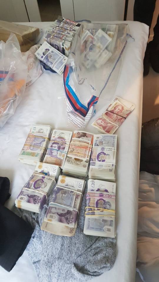 Stacks of British pounds seized during a drug bust.