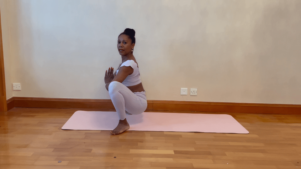 Malasana is 'great for opening the hips and releasing gas', Aysha says