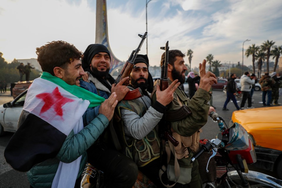 Rebels are celebrating in Damascus after they seized control of the country