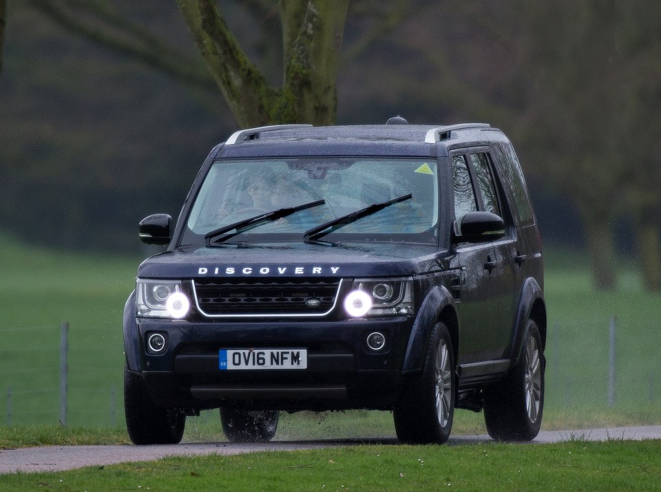 Ten-year-old James, Viscount Severn driving a Land Rover Discovery at Windsor Castle.