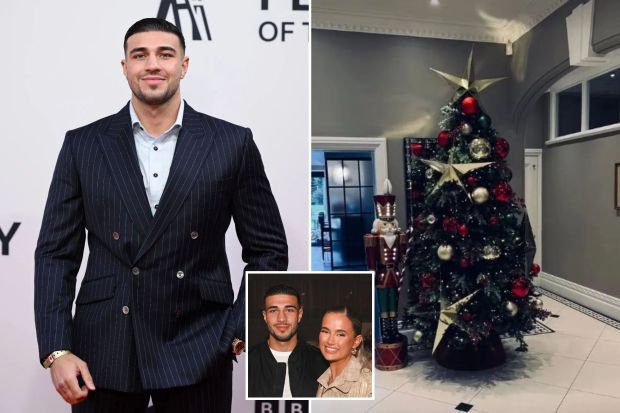 Tommy Fury, his partner, and their decorated Christmas tree.