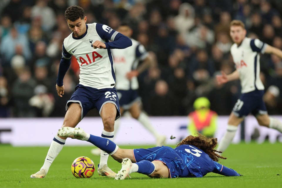 Brennan Johnson of Tottenham Hotspur challenges for the ball.