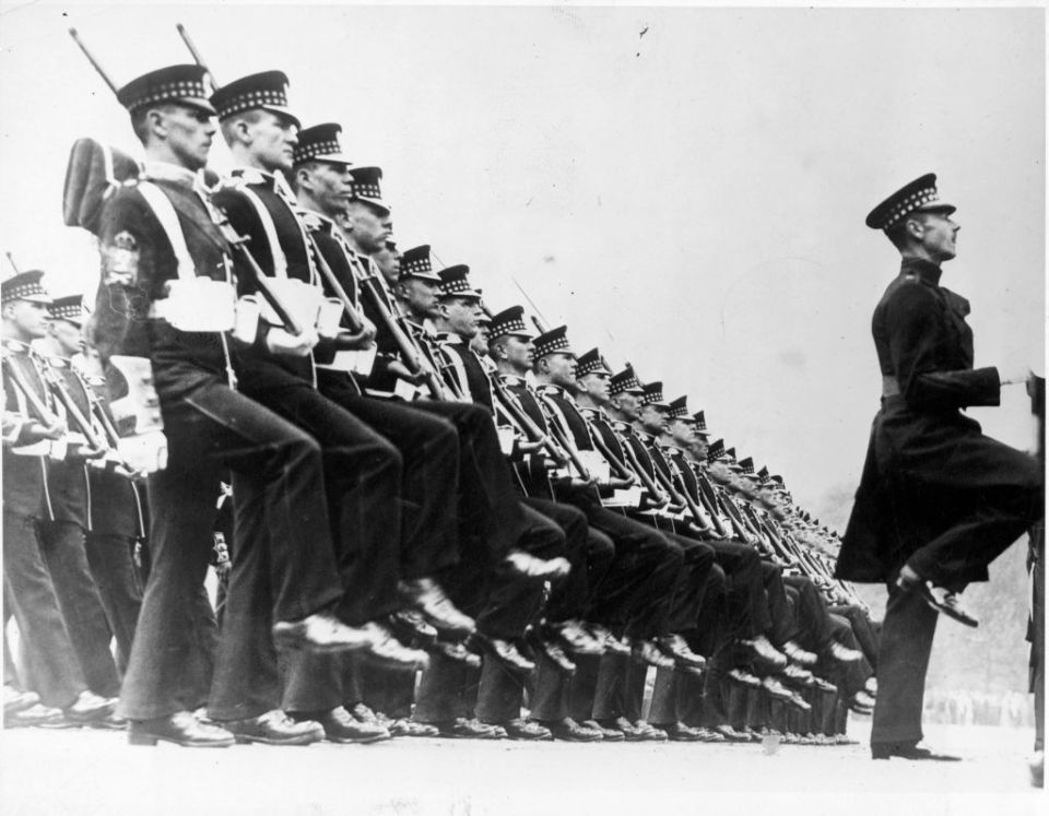 Royal troops performing a goose step.