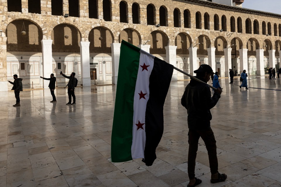 Visitors gather at the nearby Umayyad Mosque in Damascus