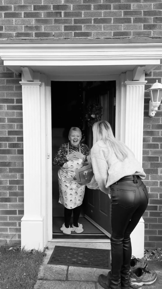 A woman surprising her former teacher at her doorstep after 15 years.