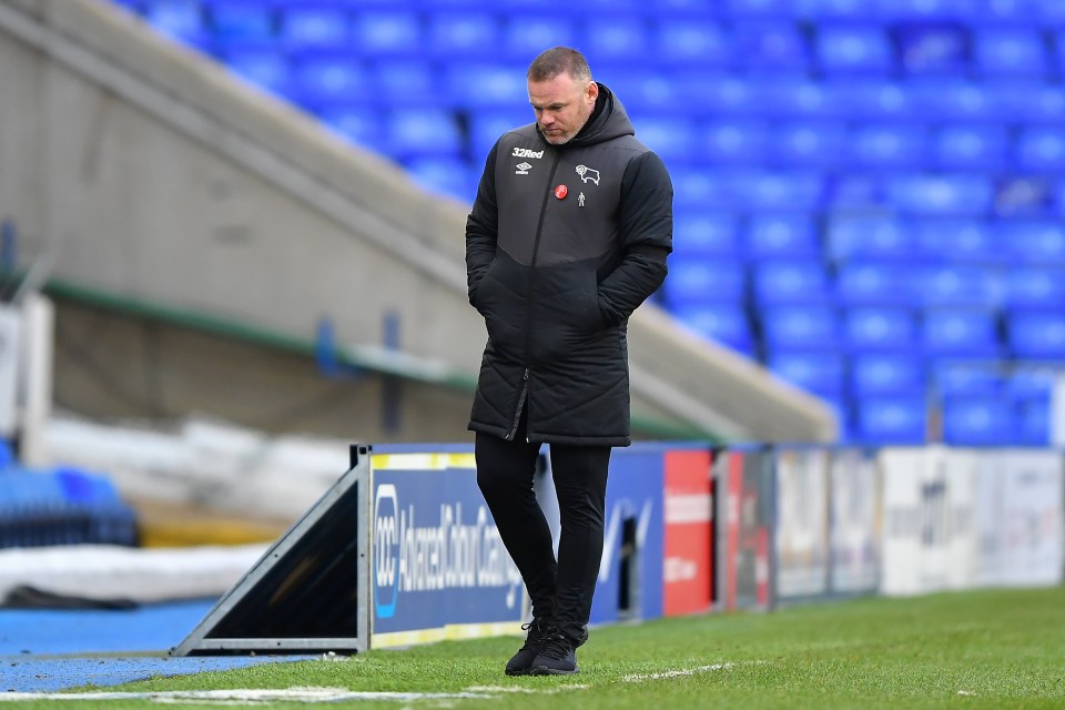 Wayne Rooney, manager of Derby County, looking dejected.