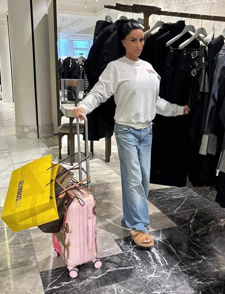 Katie was seen lugging around a Louis Vuitton suitcase, as well as a pink one, and a Selfridges branded bag