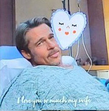 Photo of Brad Pitt in a hospital bed with a heart-shaped decoration, text reading "I love you so much my wife".