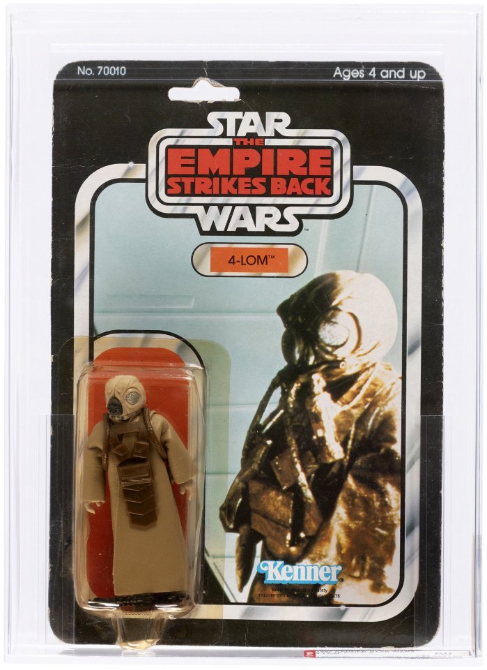 Star Wars 4-Lom action figure in original packaging.