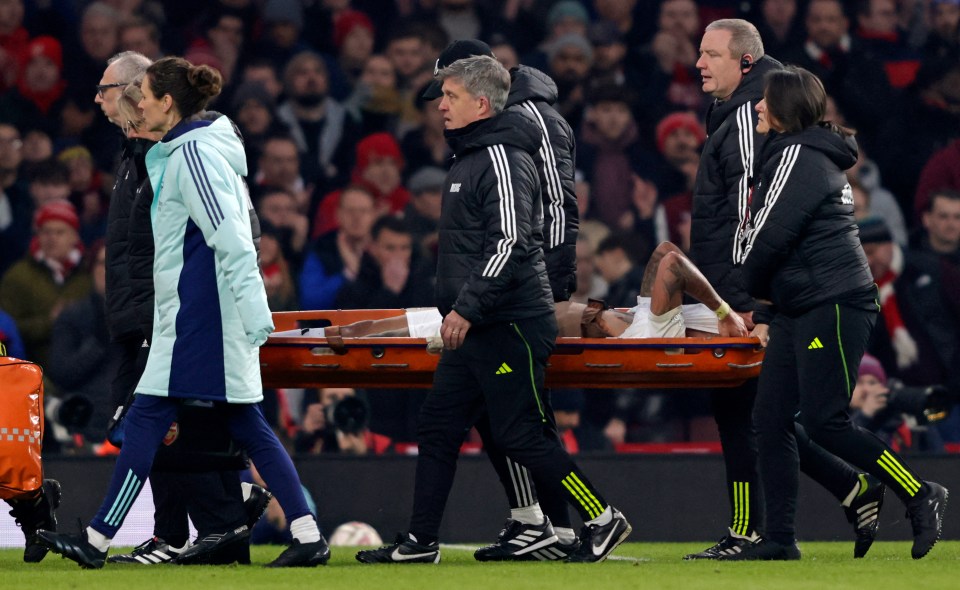 Arsenal's Gabriel Jesus being stretchered off the field.