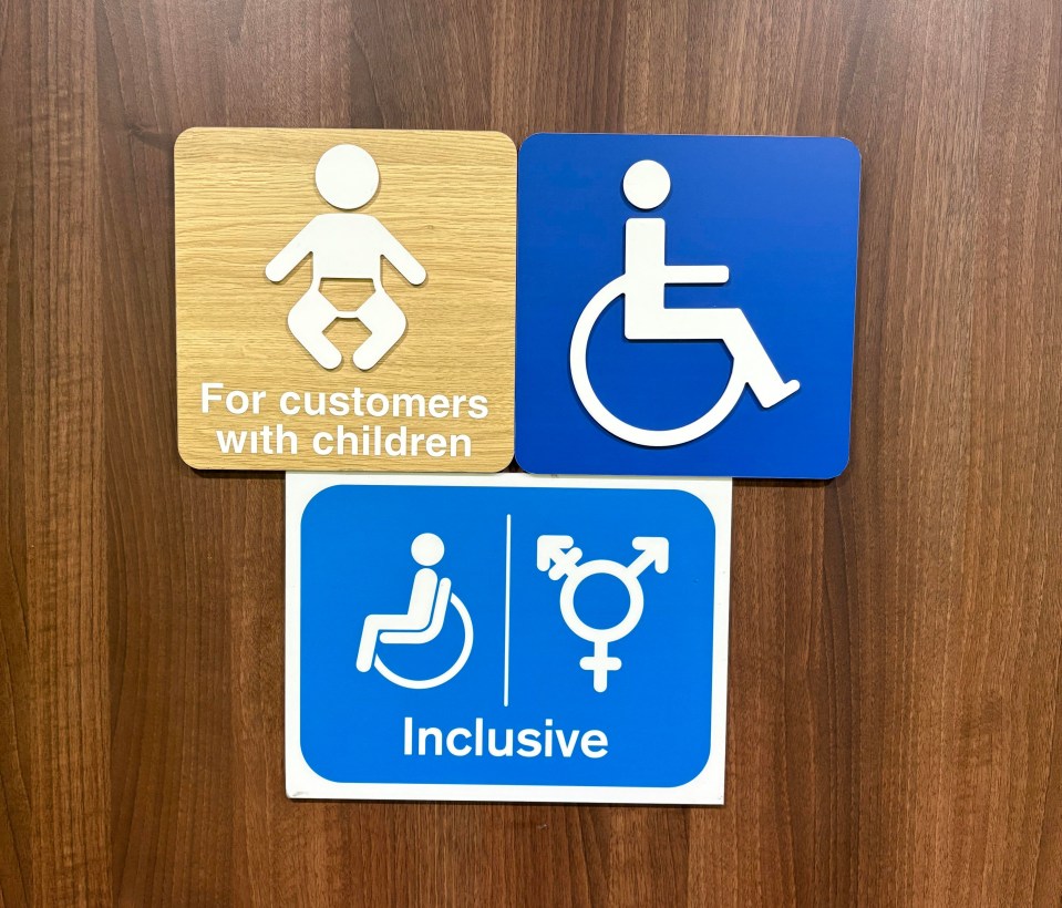 Restroom signage indicating facilities for customers with children, wheelchair users, and an inclusive restroom.